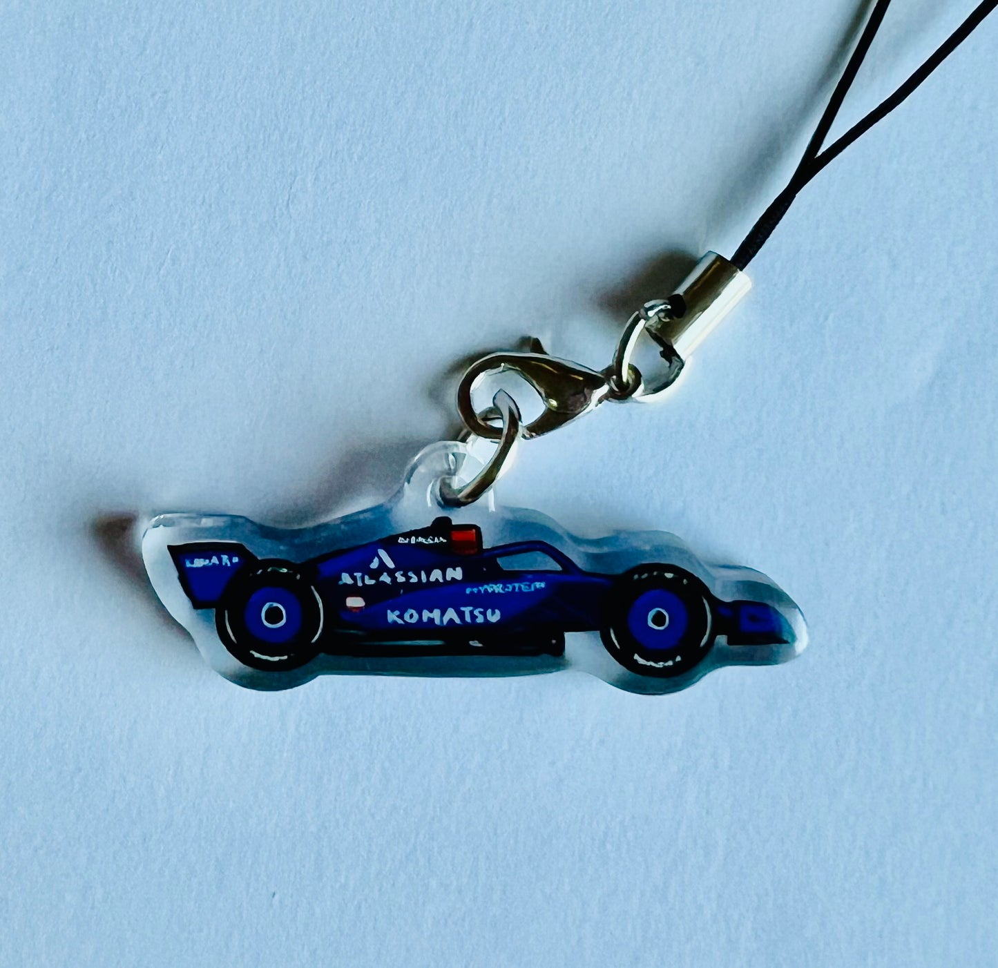 A F1 Car Phone Charm